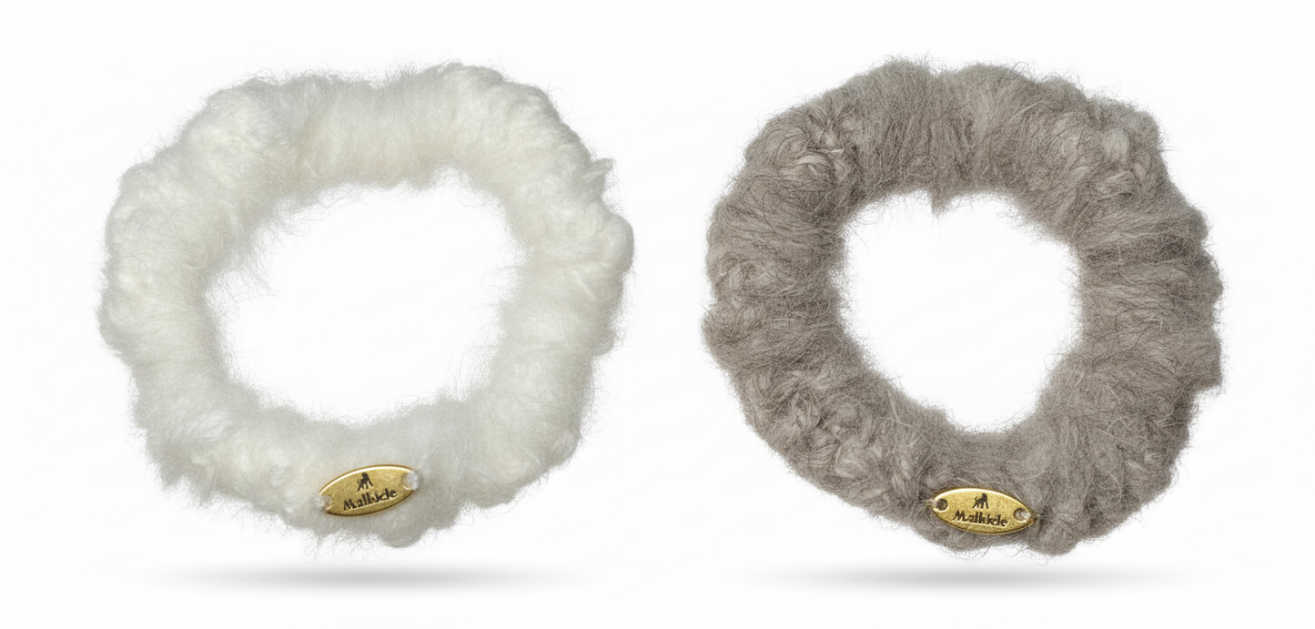 Product photo of cashmere and mink hair ties set of two, in white and grey colours.
