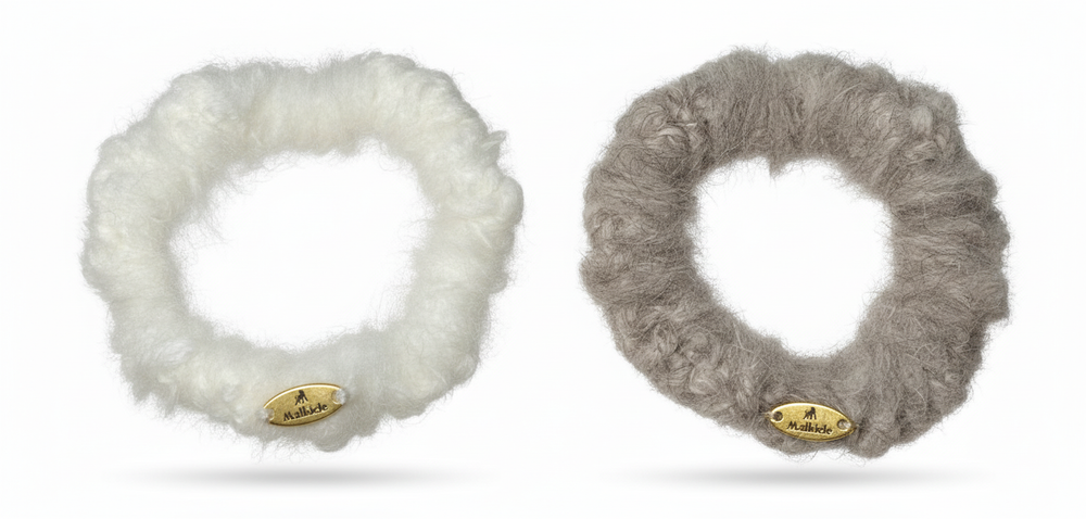 
                  
                    Product photo of cashmere and mink hair ties set of two, in white and grey colours.
                  
                