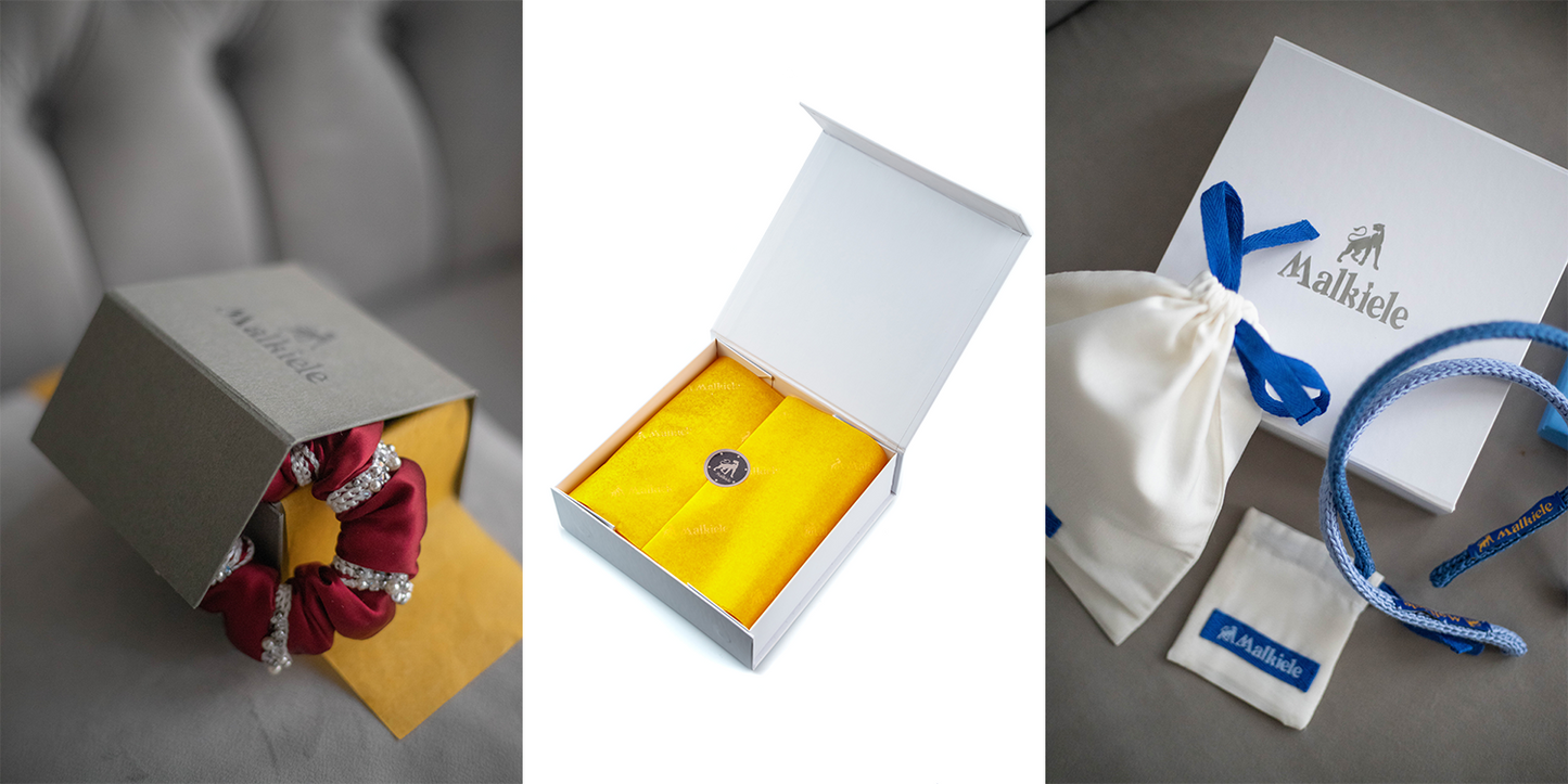 Set of three Festive gift packaging Magnetic boxes Malkiele designer with silk accessories inside.