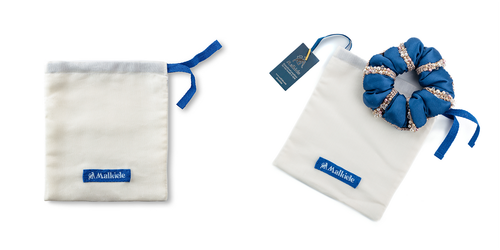 Malkiele size guide for Preferred double cotton dust bags, medium size, one blue scrunchie is placed on the white dust bag.