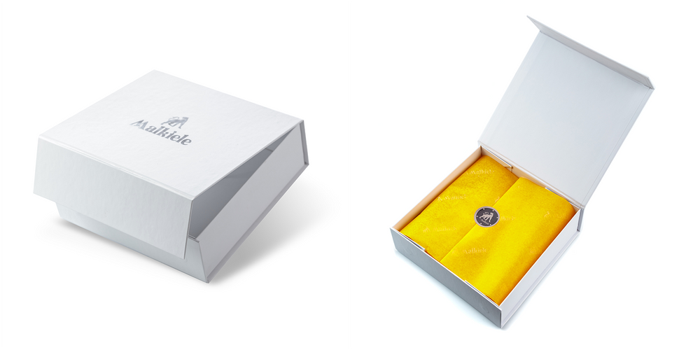 Malkiele size guide for Festive gift magnetic box, white colour, the opened box with yellow tissue paper inside.