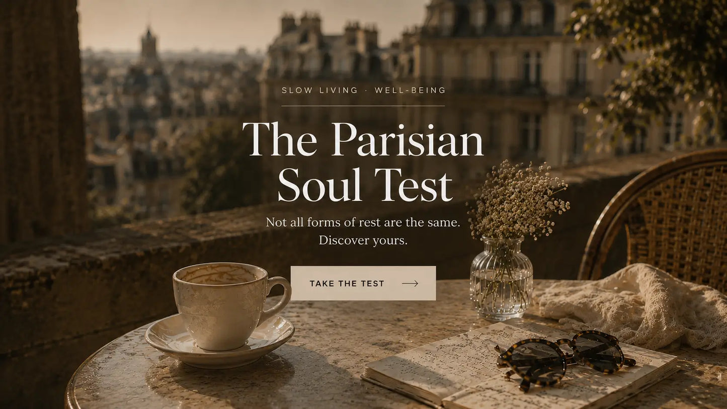 Café scene with a cup of coffee, saucer, and book on a table with a Parisian view in the background.