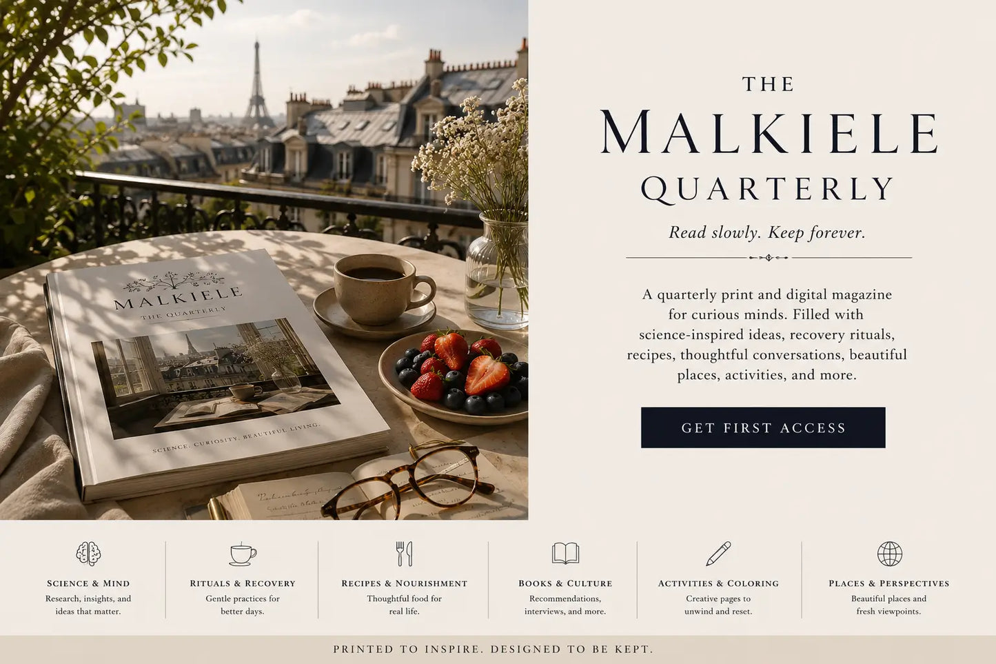 Malkiele Quarterly magazine on a table with a view of the Eiffel Tower.