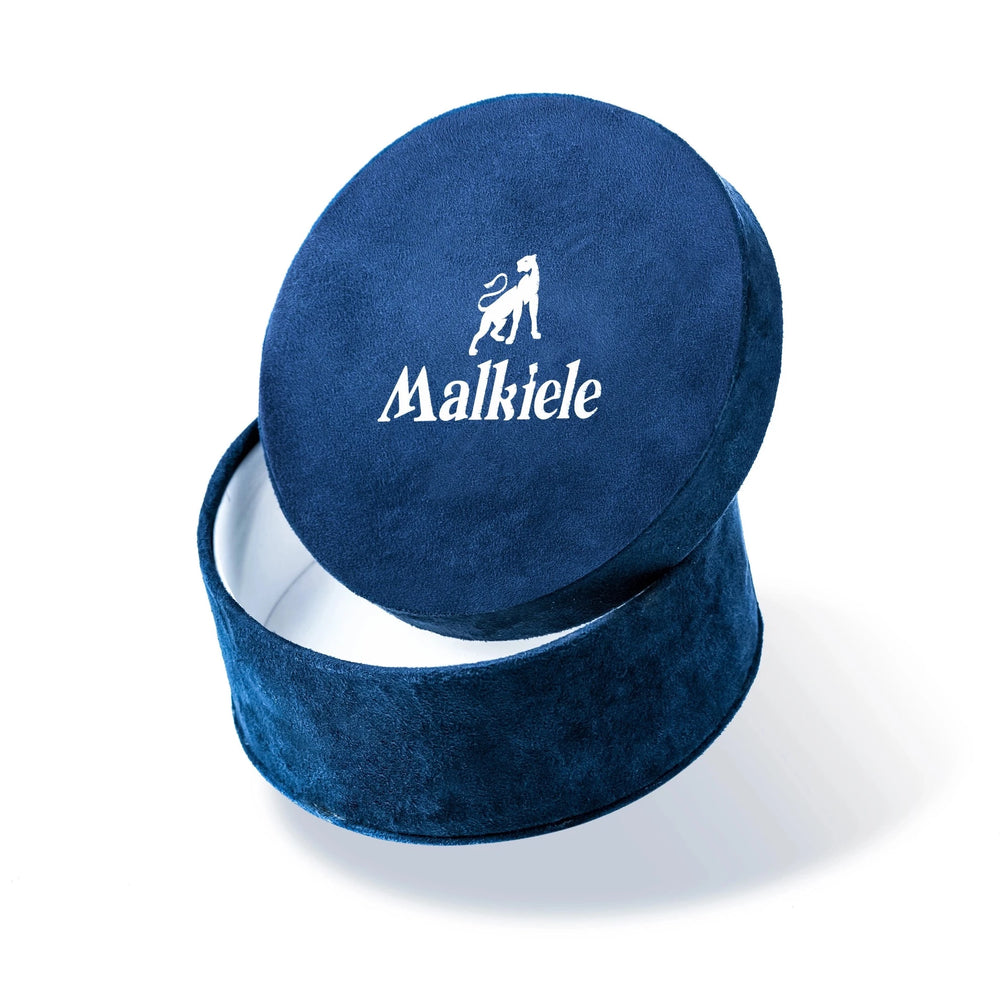 Malkiele designer, dark blue round velvet box with open cover, white lining, printed silver Malkiele logo and lioness on the cover, small size, name Adorable.