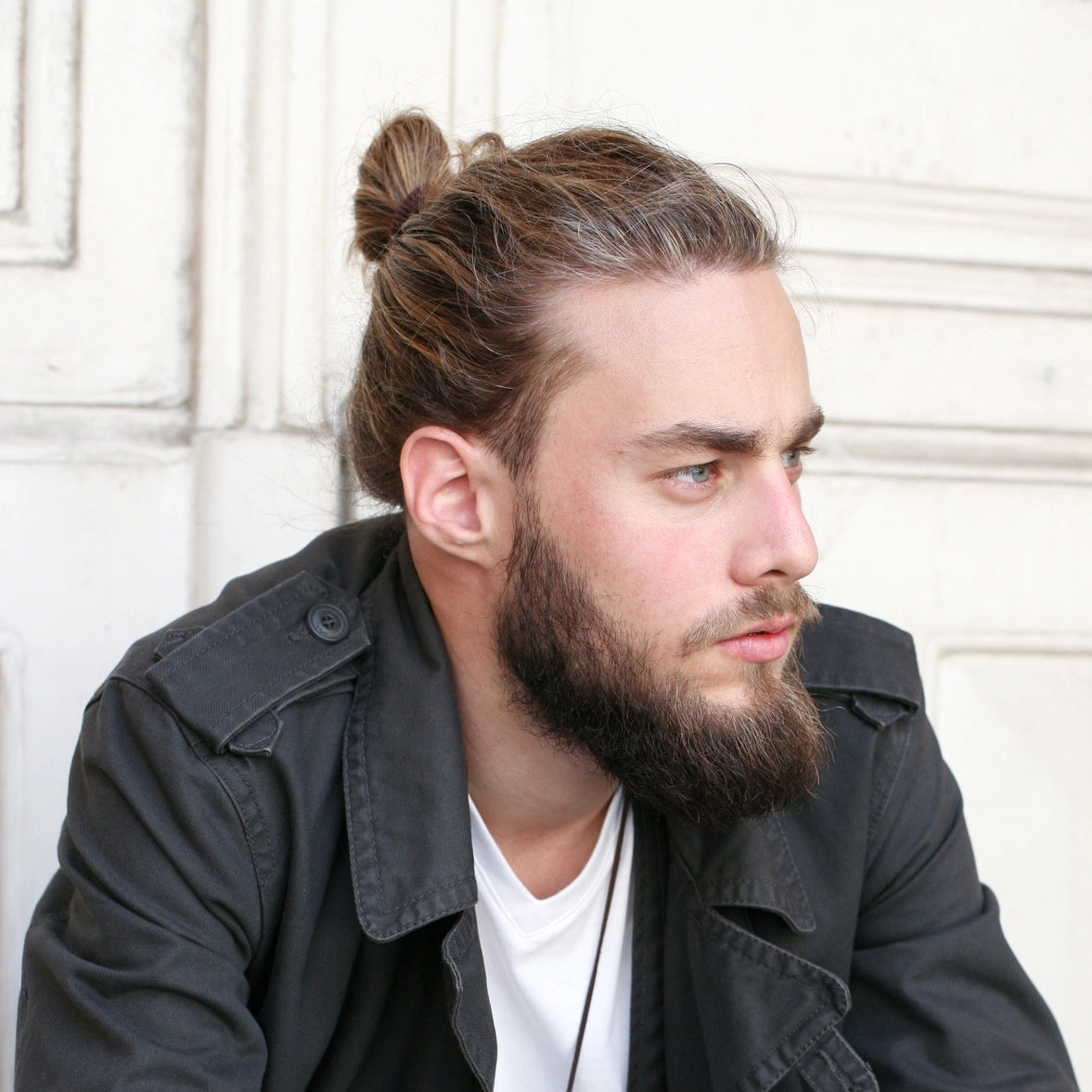 
                  
                    A man with a bun wears Malkiele silk hair tie
                  
                