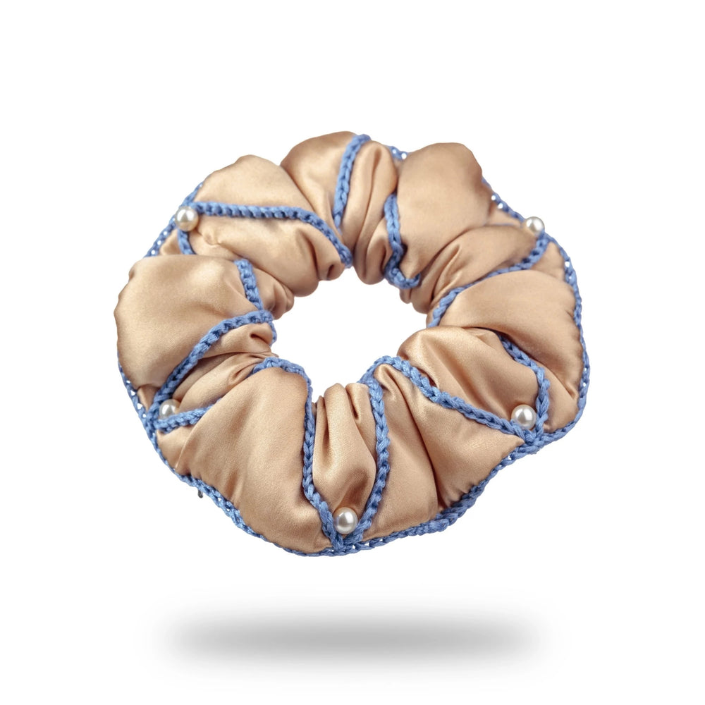 
                  
                    Malkiele designer, beige silk scrunchie for woman, embellished with 6 white pearls from Swarovski® and light blue silk knit ribbon, premium and sustainable, name Majestic.
                  
                