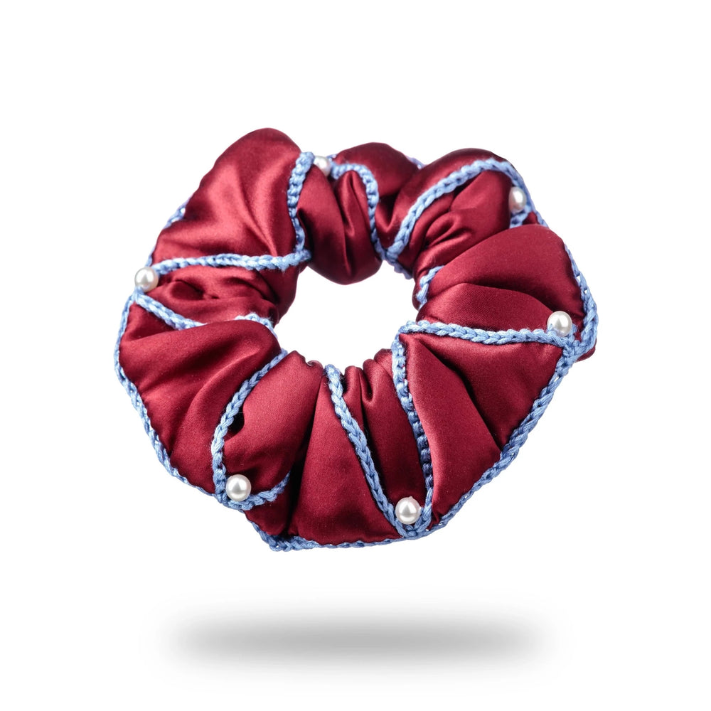 
                  
                    Malkiele designer, burgundy silk scrunchie for woman, embellished with 6 white pearls from Swarovski® and light blue silk knit ribbon, premium and sustainable, name Majestic.
                  
                