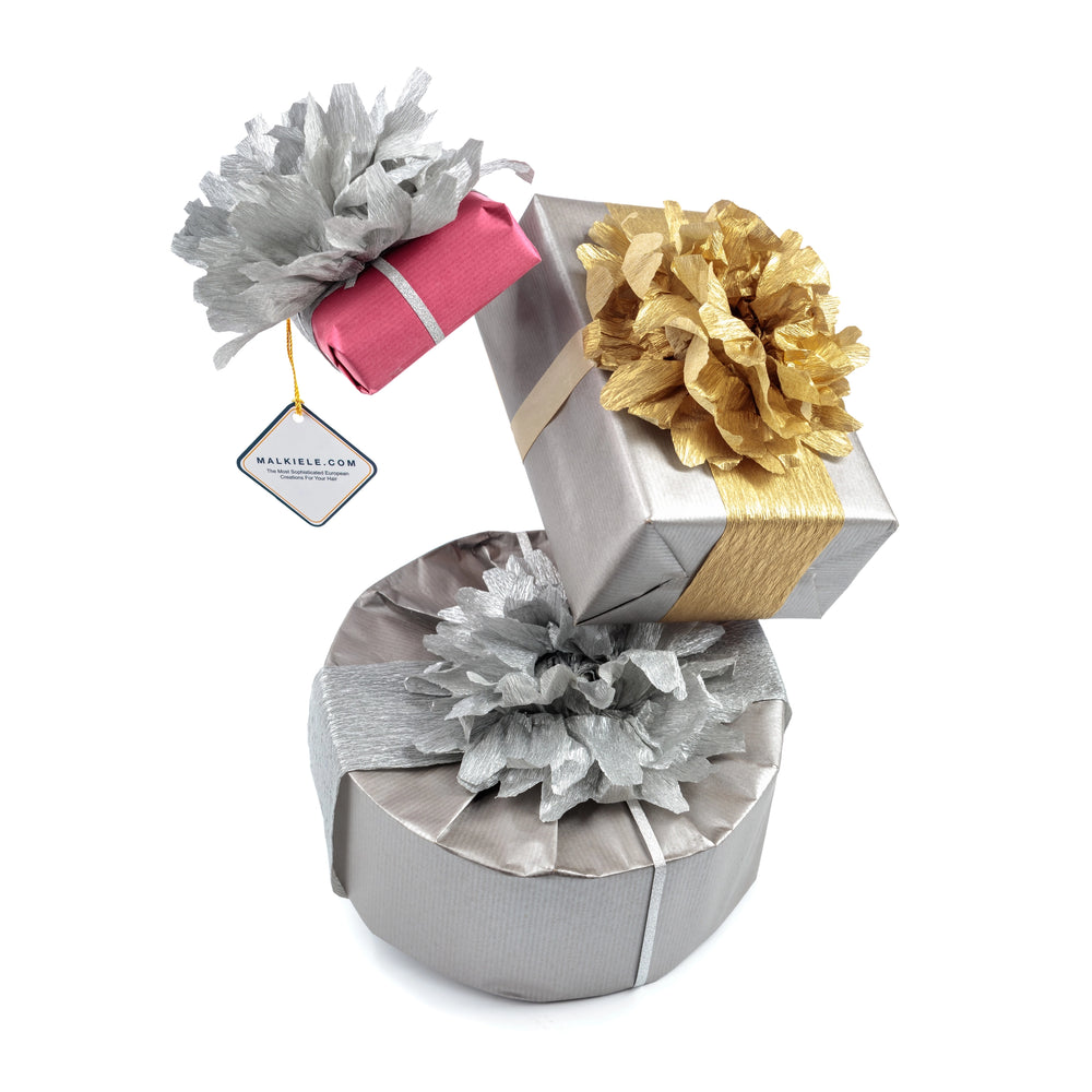 The set of three gift boxes, luxury wrapping, in silver, gold and pink colors, Malkiele sustainable designer.