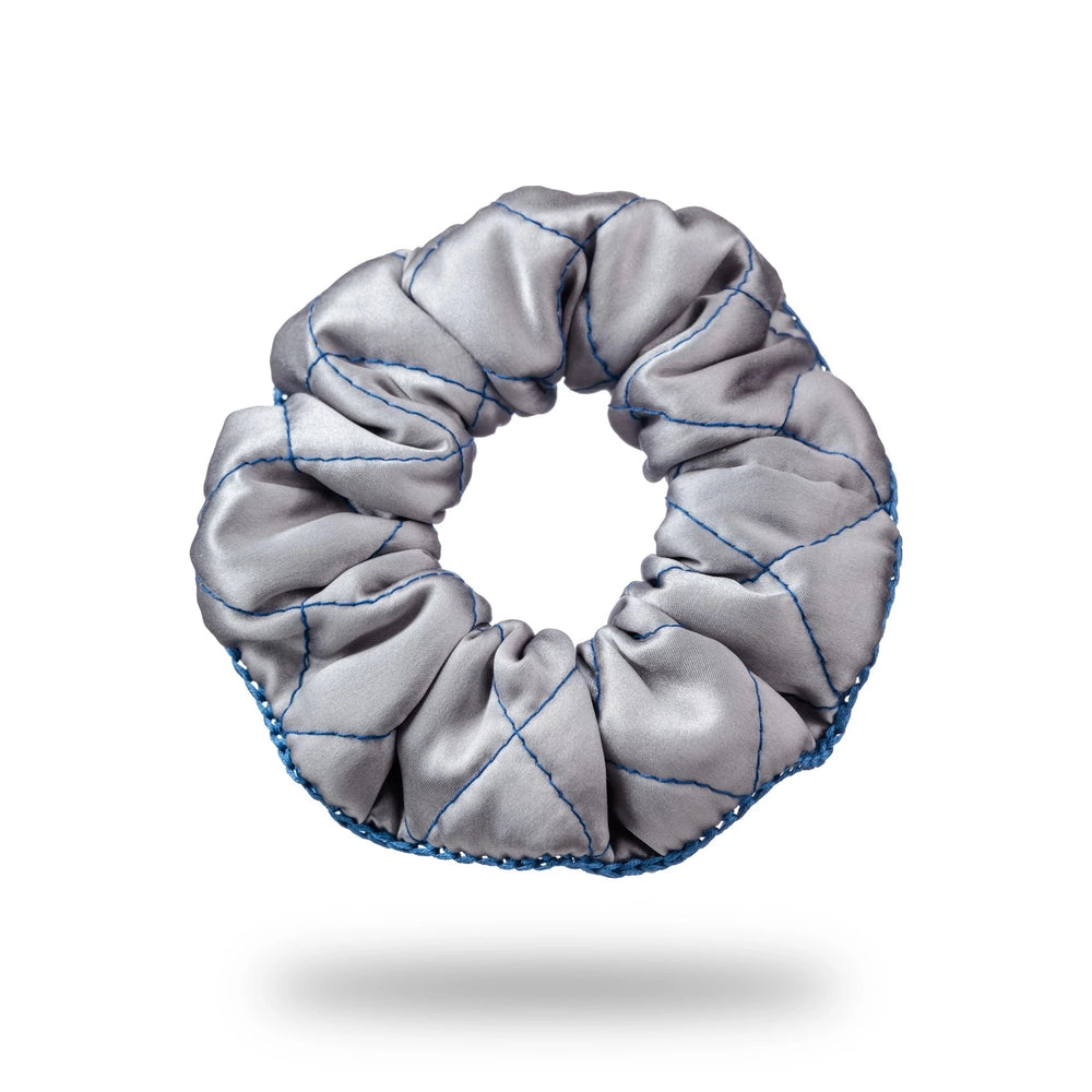 
                  
                    Malkiele designer, grey silk quilted scrunchie for woman, embellished with blue silk knit ribbon, premium and sustainable, name Morning Passion.
                  
                