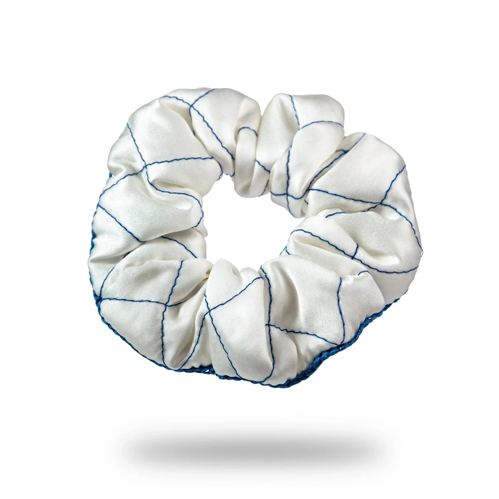 
                  
                    Malkiele designer, white silk quilted scrunchie for woman, embellished with blue silk knit ribbon, premium and sustainable, name Morning Passion.
                  
                