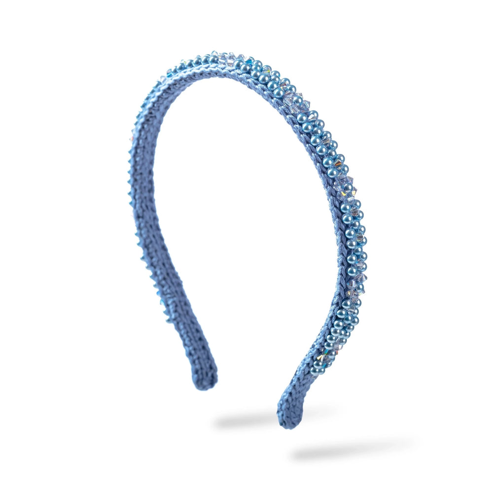 Malkiele designer, light blue silk knit headband for woman, embellished with light blue crystals from Swarovski, premium and sustainable, name Victorious.