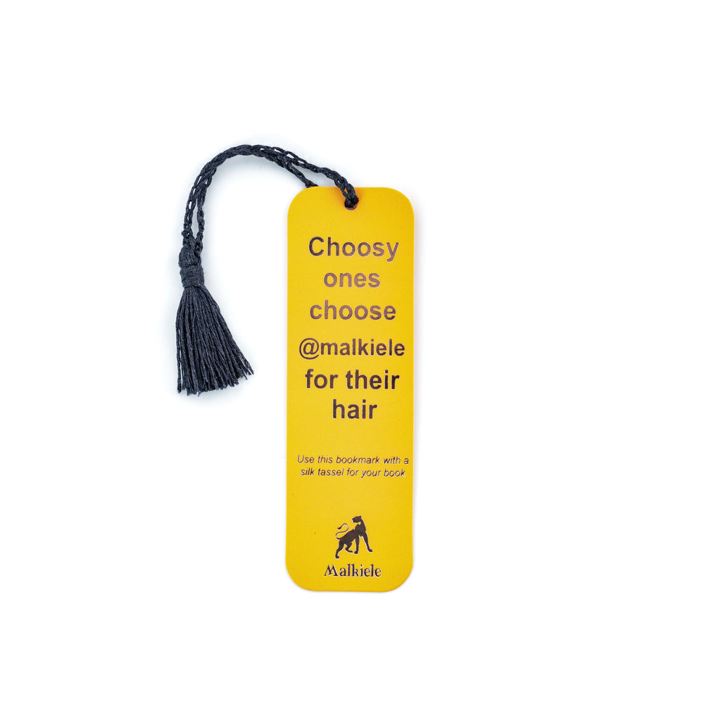 Malkiele designer, yellow bookmark, with silver logo and text, embellished with navy blue silk tassel, premium and sustainable, name Witty.